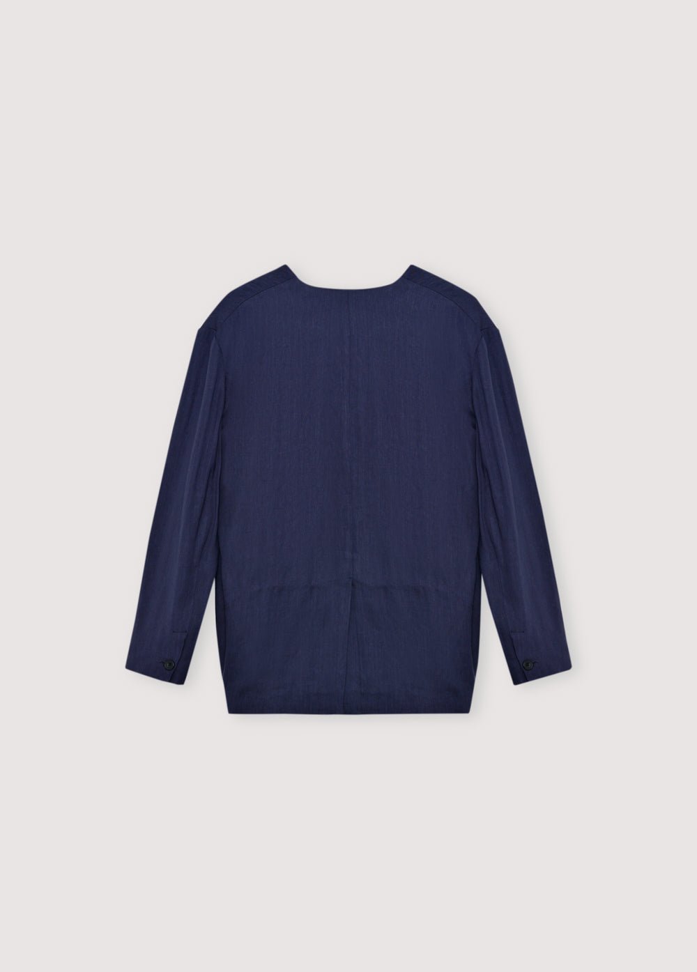 Linen and viscose blazer made in our workshops in Spain. Features a front opening with a notched collar, tone - on-tone button closure, and two front pockets.