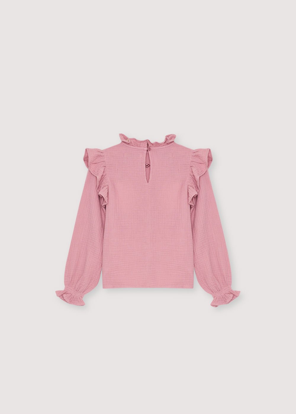 One of our classic double gauze blouse patterns, featuring contrasting embroidery detail at the front. 