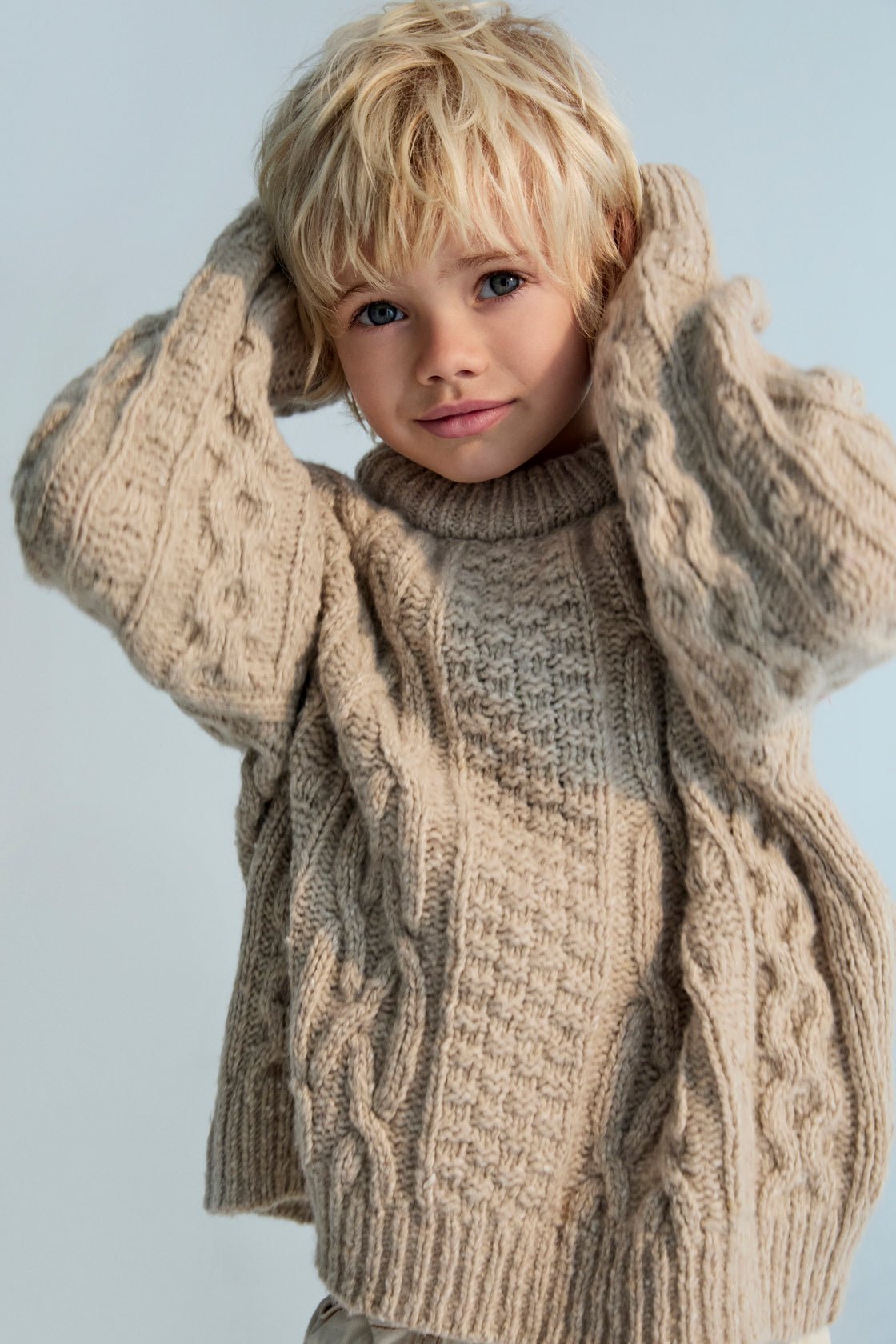 One of our classic knit patterns, this time crafted in recycled wool quality with a new textured knit design.