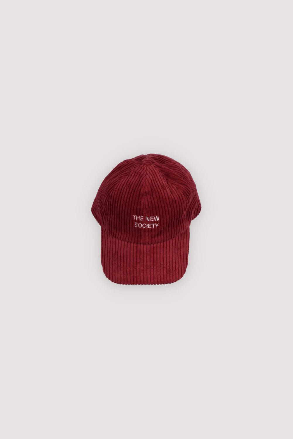 Corduroy cap with contrasting brand embroidery. Perfect for pairing with the Mikel bomber or any other look from the collection. Adjustable at back.