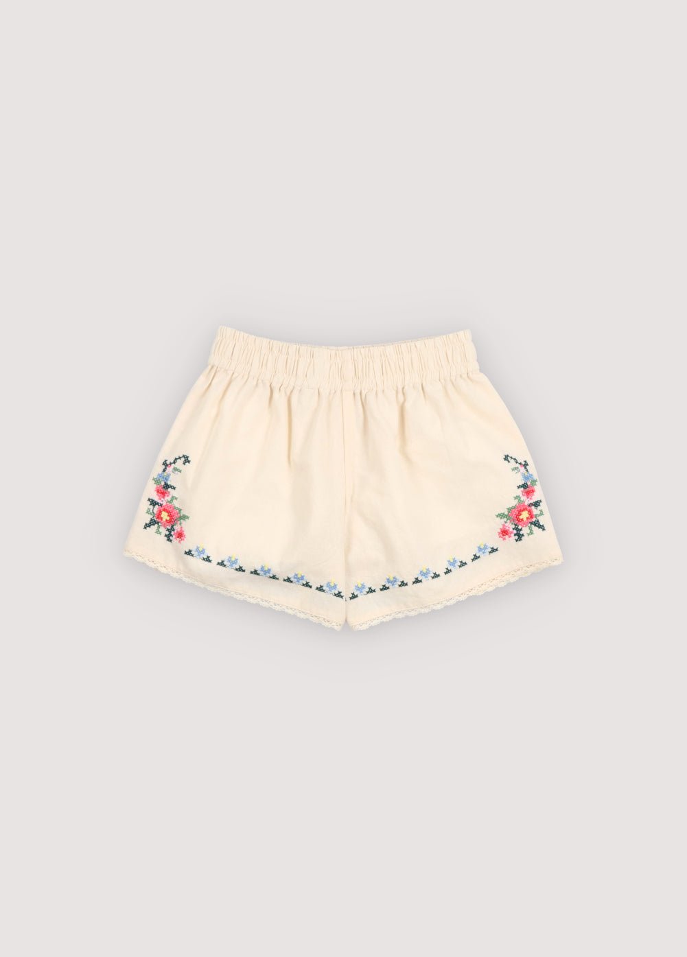 Shorts in soft cotton featuring a comfortable elastic waistband and beautiful embroidered details that add a delicate, handcrafted touch.