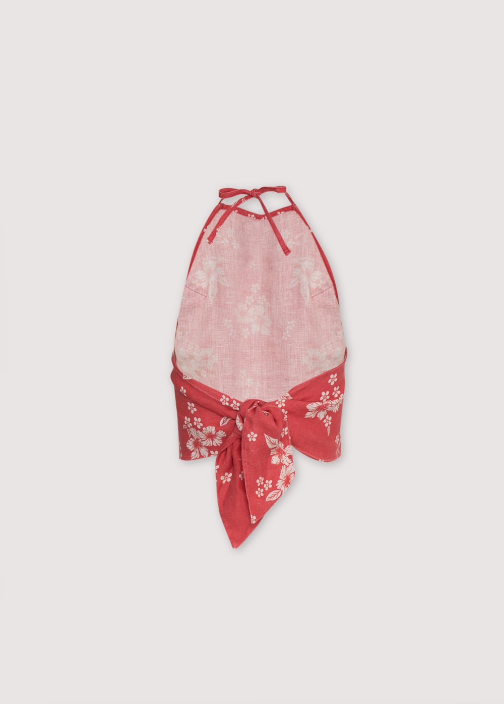 Top Femme Nauplia en 100% lin avec notre imprimé fleurs de plage chili, doté d'un décolleté dos nu et noué dans le dos par un nœud.