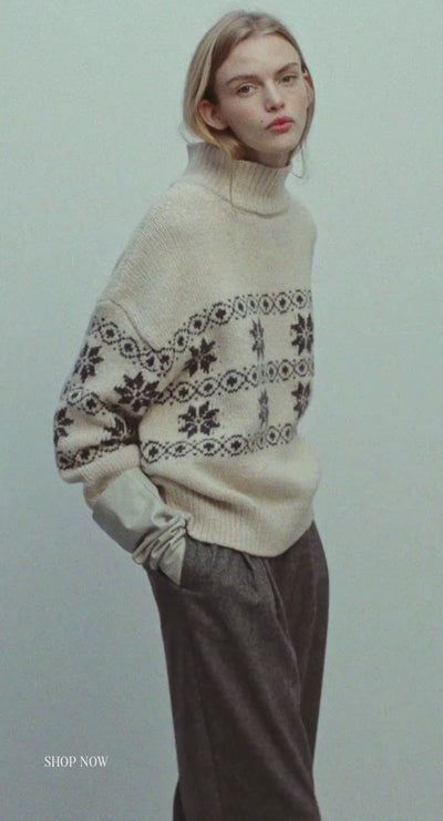 The Lilo Woman Jumper blends timeless Nordic-inspired jacquard detailing with a soft, cosy knit for effortless winter style.