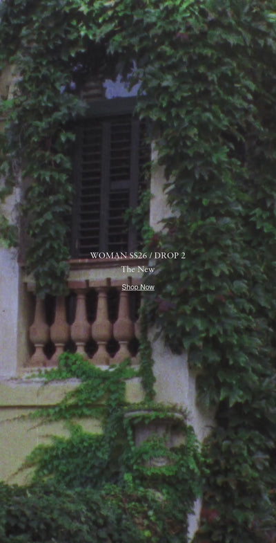 Model in a flowing linen set from the new Spring Summer 2026 collection walking outdoors.