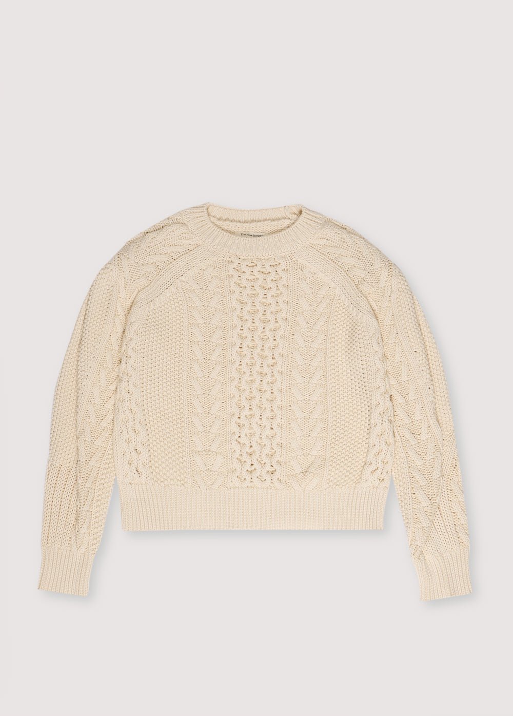 One of our best-selling sweaters. Knitted with an original structure and featuring a pleat detail on the sleeve. Sprin Summer Collection. The New Society.