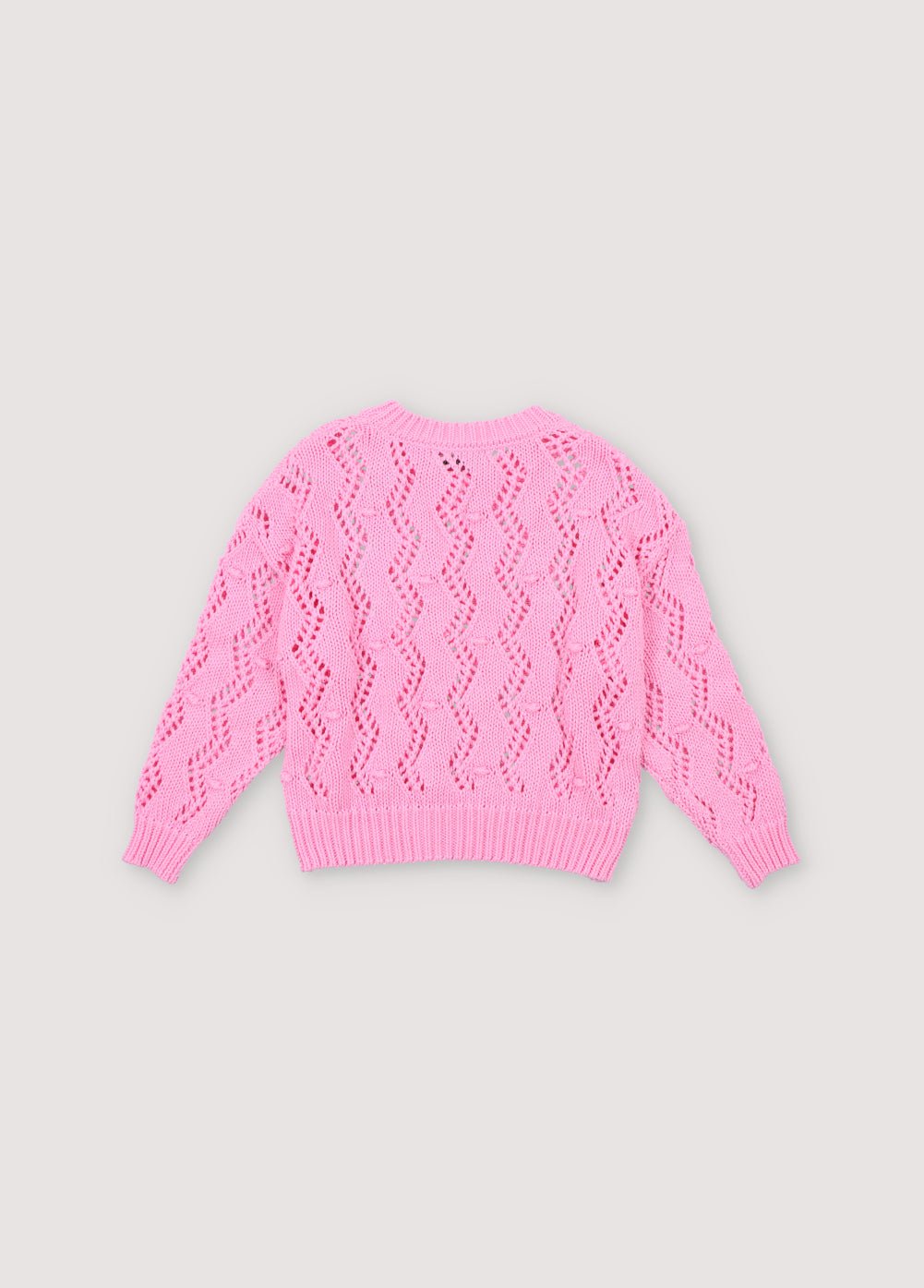 Sweater with an original textured knit that makes it a special garment. It features ribbing on the neckline, cuffs, and hem, and has a dropped shoulder sleeve design. Spring Summer Collection. The New Society. 