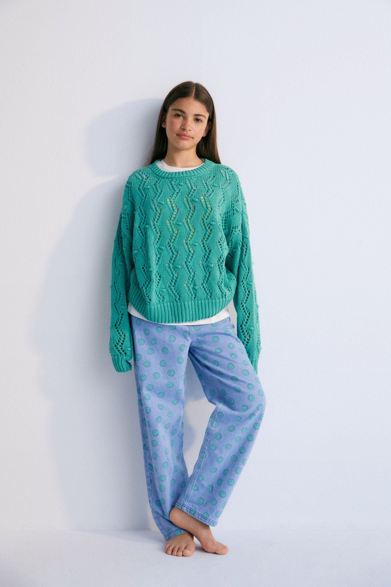 weater with an original textured knit that makes it a special garment. It features ribbing on the neckline, cuffs, and hem, and has a dropped shoulder sleeve design. Spring Summer Collection. The New Society. 