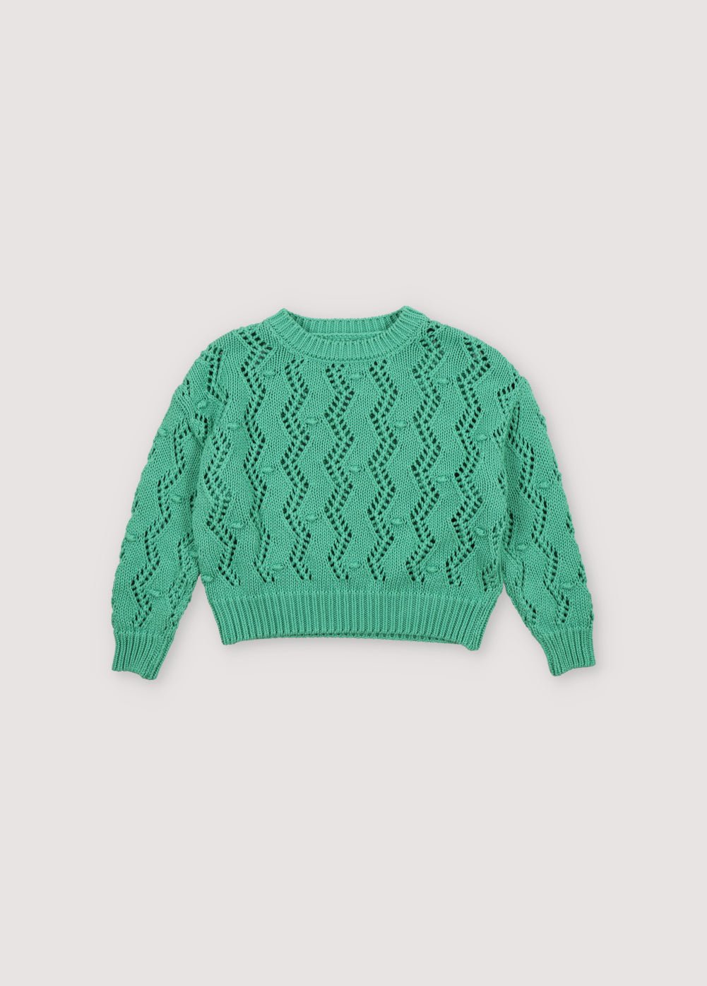 weater with an original textured knit that makes it a special garment. It features ribbing on the neckline, cuffs, and hem, and has a dropped shoulder sleeve design. Spring Summer Collection. The New Society. 