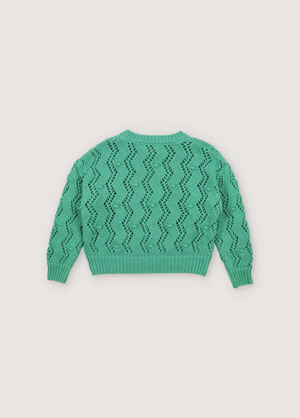 weater with an original textured knit that makes it a special garment. It features ribbing on the neckline, cuffs, and hem, and has a dropped shoulder sleeve design. Spring Summer Collection. The New Society. 