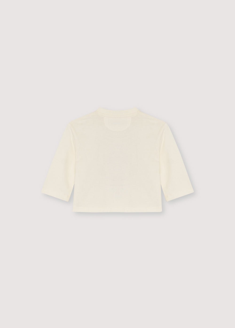 フロントにカラフルなSMILEY WORLDプリントを施した長袖Tシャツ。外側は起毛加工が施されています。