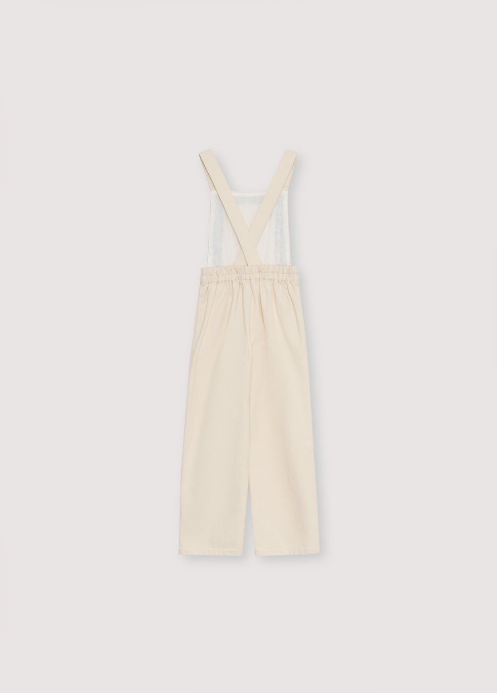 Denim overall with contrast embroidery details on the upper front and two patch pockets in the front. It features an elastic waistband at the back and adjustable straps at the back.