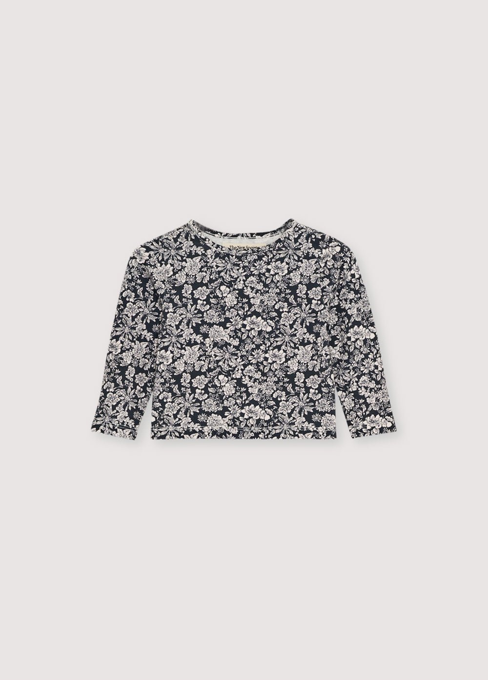 ラウンドネックと花柄のジャージー T シャツ。トーンオントーンのスナップが付いた肩の開口部が特徴です。同素材のレギンスと合わせてトータルルックを完成させましょう。