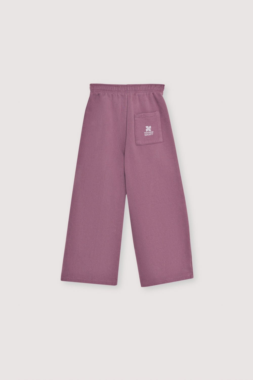 Fleece joggers brushed inside and outside  with a wide-leg fit and an elastic, adjustable waistband with a drawstring. Brushed on the inside and outside. It has an embroidery detail on lurex cord. 