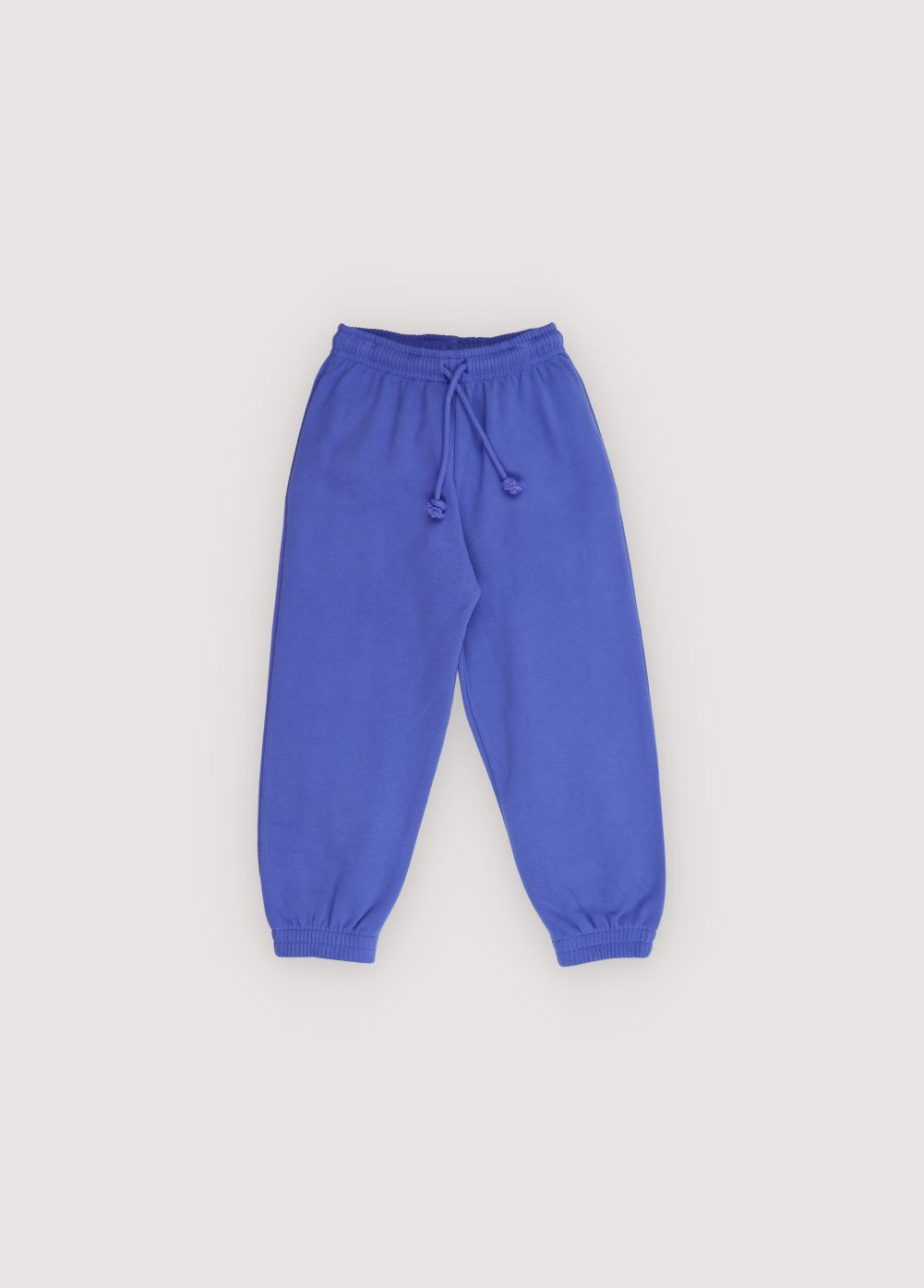 Fleece joggers brushed inside and outside
 with an adjustable elastic waistband and drawstring, and elastic cuffs. Perfect for creating a comfortable total look with the matching sweatshirt. It features a brand print detail on the front side. Brushed on the inside and outside.