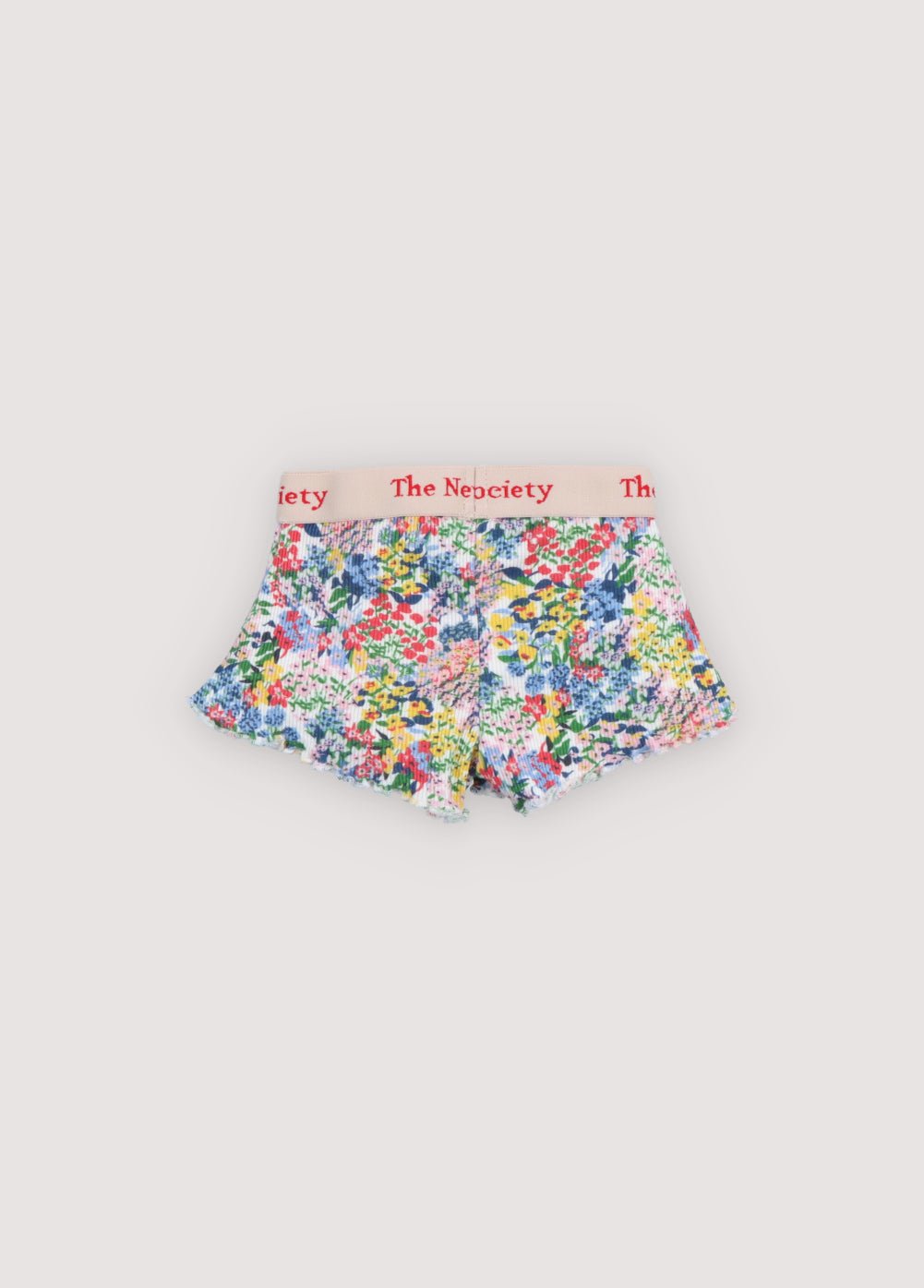 Soft rib cotton shorts featuring a colorful flower print and a baby overlock finish.