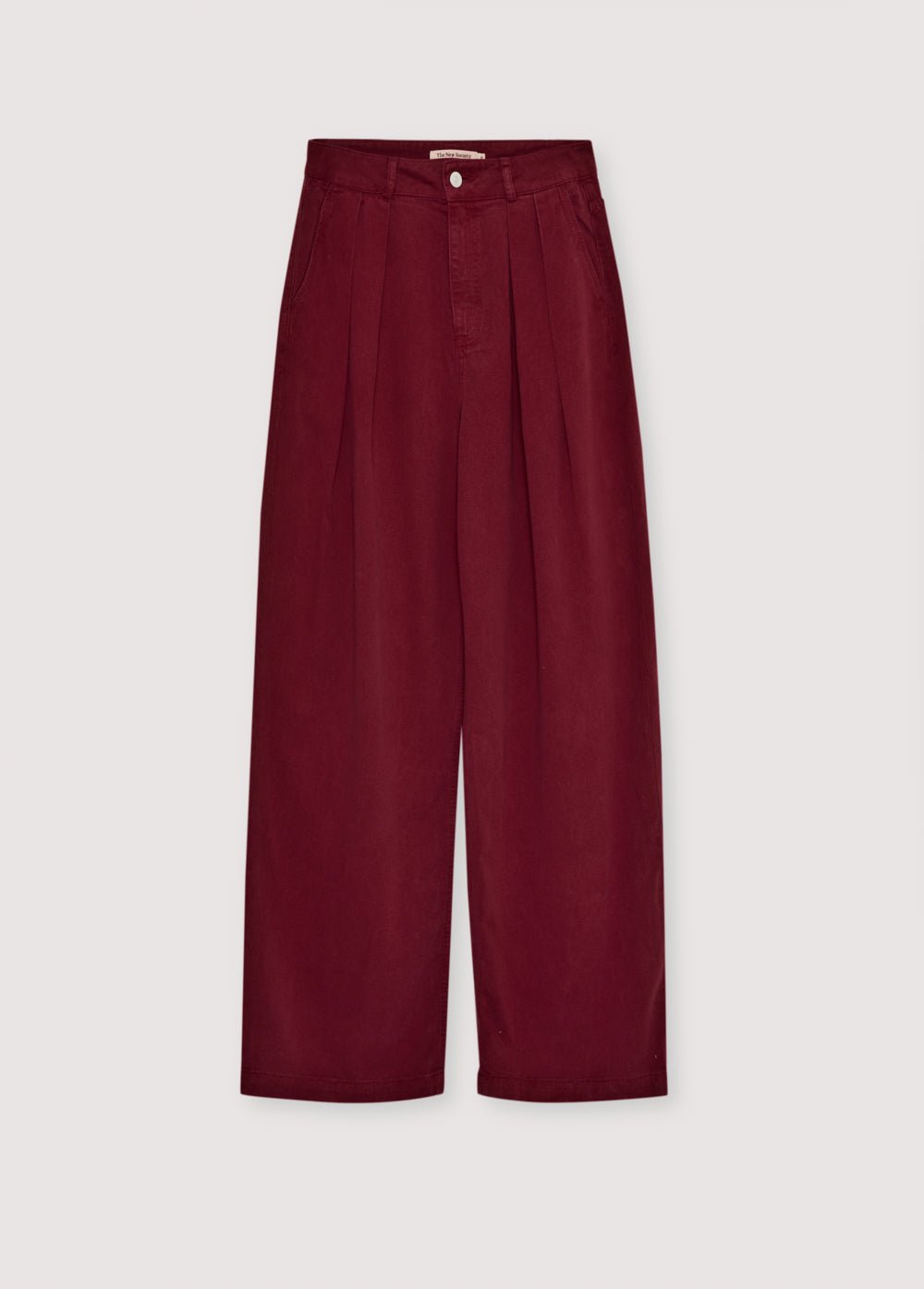 Un de nos best-sellers : le pantalon droit en Tencel avec détails plissés, disponible en trois coloris. Il est livré avec une chemise assortie pour créer un look complet et coordonné.